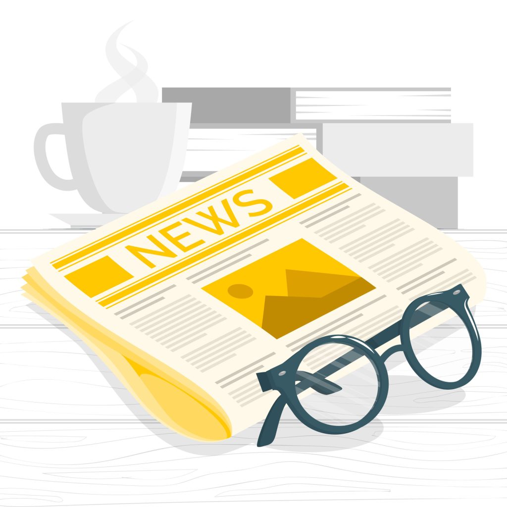 Newspaper, glasses and coffee cup